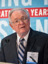 DENNIS E. GREGG
