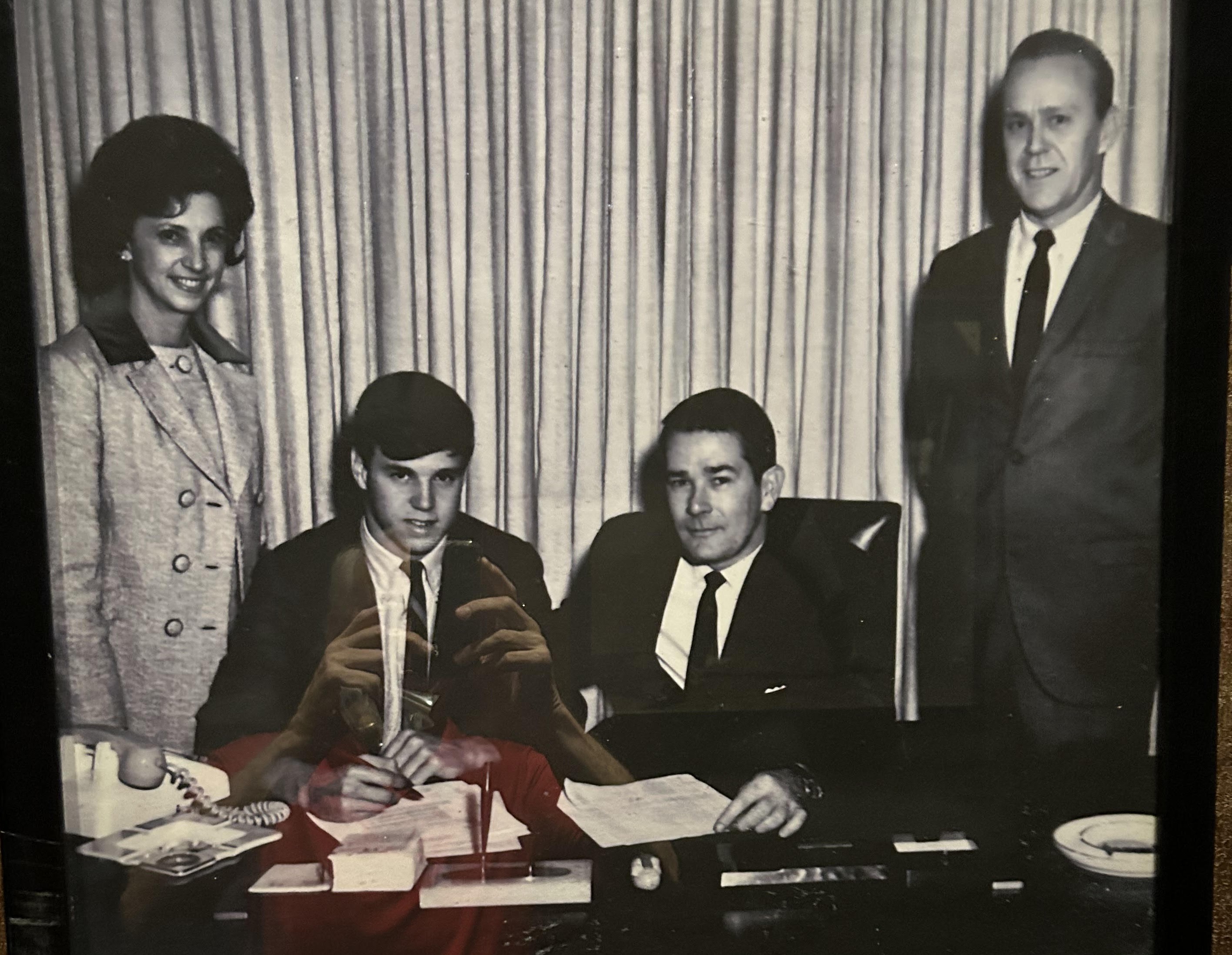 Steve Morgan signing his Ga Tech scholarship with  his Mother, Jean Morgan, - 31 years the receptionist at St. Pius) and my Dad Frank Morgan with Ga Tech head coach Bud Carson