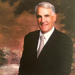 VERNON "BUD" ISAACS